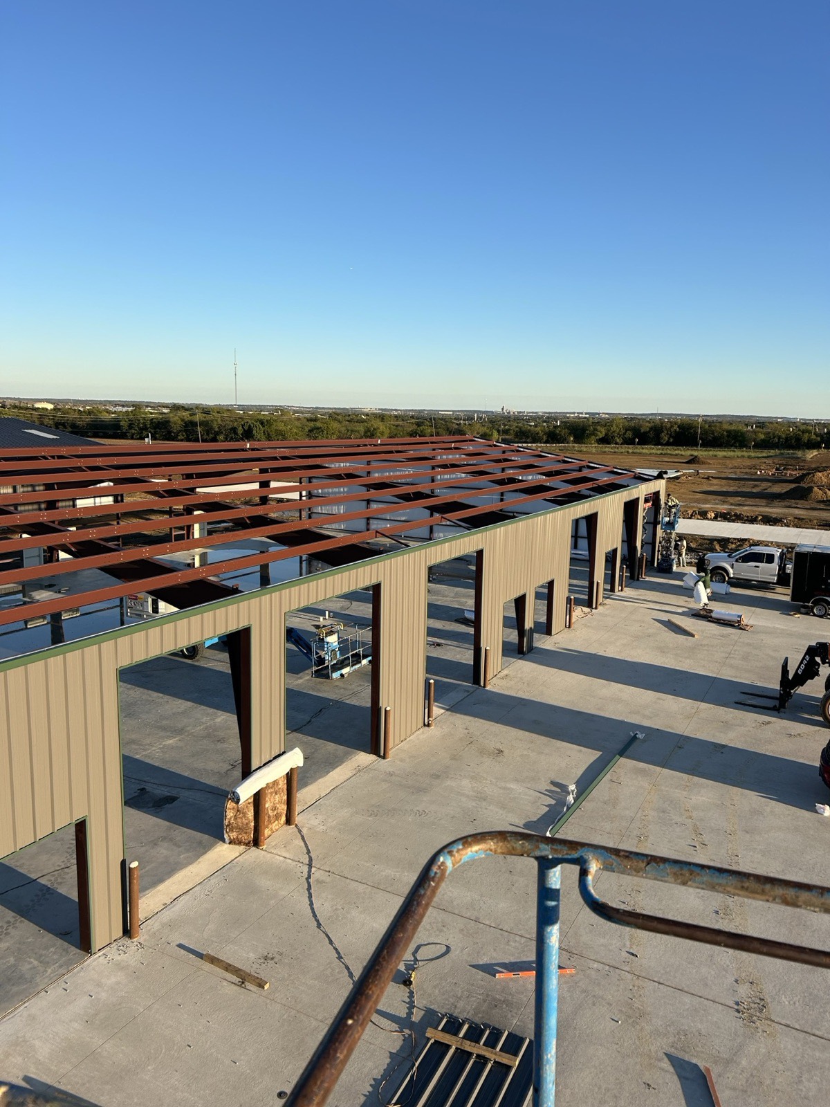 Commercial steel building frame and wall panels going up in North Texas